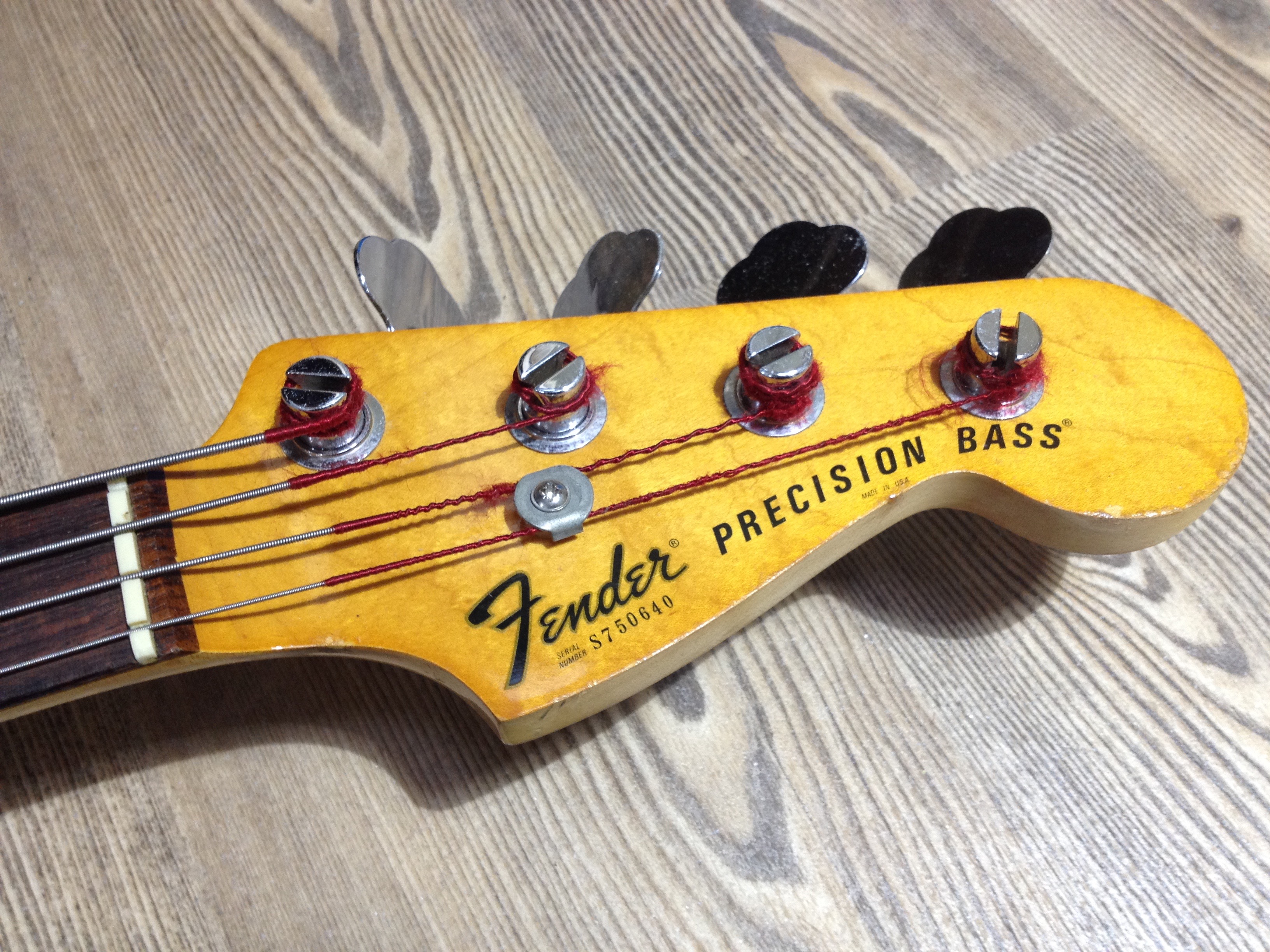 A Fender Precision Bass guitar serial number S750640 with hard case
