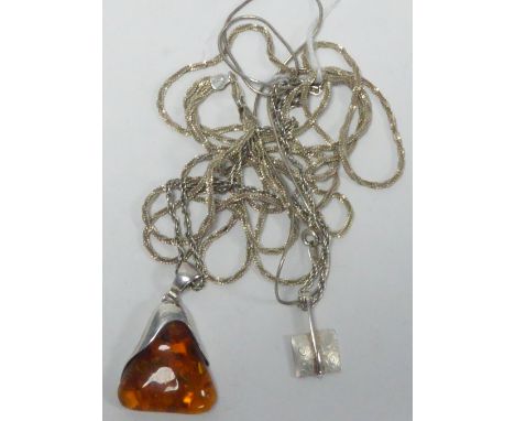 SILVER TRIPLE STRAND NECKLACE of twist chain pattern; a SILVER FINE CHAIN NECKLACE, with large silver mounted golden amber tr