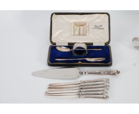 CHILDS SILVER FORK AND SPOON with painted handles together with a REPLACEMENT ENGINE TURNED SILVER NAPKIN RING in a plush lin