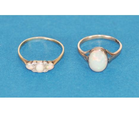 18ct GOLD AND PLATINUM RING set with three opals and four tiny diamonds and 9ct GOLD RING collet set with a cabochon oval opa