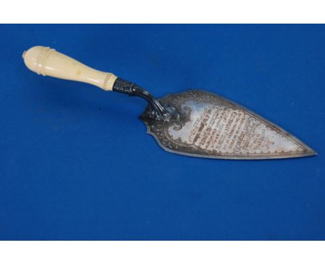 VICTORIAN ENGRAVED SILVER PRESENTATION TROWEL, with carved ivory handle, of typical form with twelve line inscription dated 1