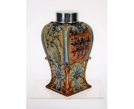 EDWARD VII SILVER MOUNTED DOULTON LAMBETH MOULDED POTTERY TEA CADDY, of square waisted form with silver collar and pull-off c
