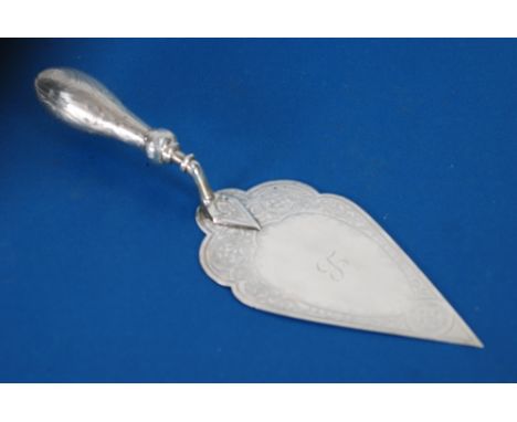 VICTORIAN SILVER CAKE SERVER OF TROWEL PATTERN, having Gothic scroll/strapwork engraved decoration to blade and the rounded a