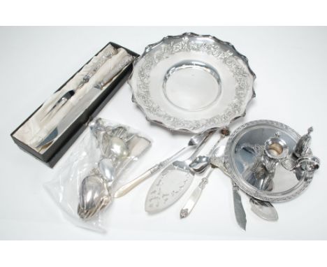 A LATE VICTORIAN/EDWARDIAN ELECTROPLATED CHAMBER STICK with removable extinguishers, a  PLATED DISH and SUNDRY CUTLERY, also 