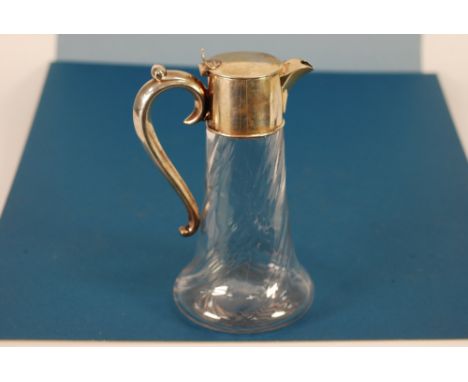 EDWARD VII SILVER MOUNTED MOULDED GLASS CLARET JUG, of spreading cylindrical form with moulded wrythen fluted decoration, ben