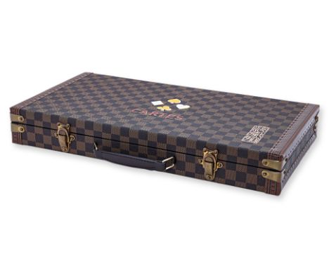 LOUIS VUITTON PLAYING CARD SET
Comprising six card decks, a small leather case containing two additional decks of cards and a
