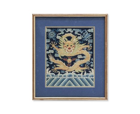 AN EMBROIDERED SILK DRAGON PANEL
Embroidered silk and golden-coloured threads, depicting a dragon flying over the sea and cha
