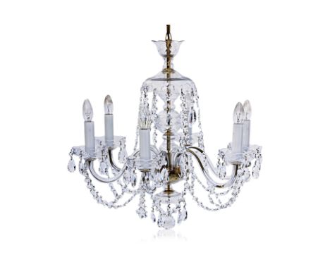 A CUT GLASS SIX LIGHT CHANDELIER
Late 20th Century. with six scroll arms, faceted chain link swags and drops
Approximately 82