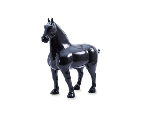 A CERAMIC TANG STYLE BLACK GLAZED MODEL OF A HORSE
Late 20th century
50cm high x 54.5 long
Condition: For a condition report 