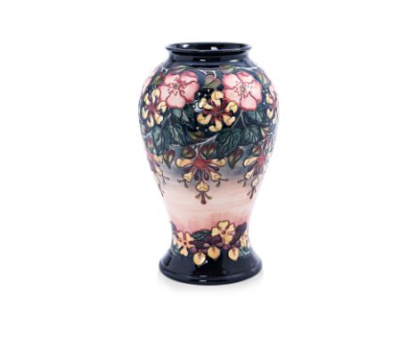 A LARGE MOORCROFT POTTERY OBERON PATTERN BALUSTER VASE
Designed by Rachel Bishop, impressed and painted marks, date code for 