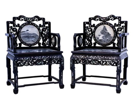 A PAIR OF MARBLE INSET BLACKWOOD ARMCHAIRS
The backrest with shaped and open-worked rail and inlayed circular marble panel, m