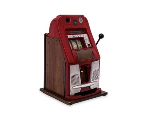 A MILLS 25c SPECIAL AWARD SLOT MACHINE American, 1950s, iron and chrome, timber sides 63cm height Condition: For a condition 