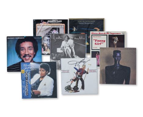 A GROUP OF 8 ASSORTED VINYL RECORDS
Including Michael Jackson - Thriller, Grace Jones - Nightclubbing, Dolly Parton - 9 To 5 
