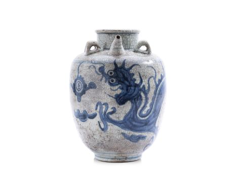 A BLUE AND WHITE DRAGON JAR
Globular-shaped, straight neck and everted moutrim, four ring-shaped elements and slightly curved