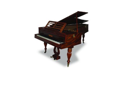 A grand piano by Pleyel, Paris, circa 1829 The mahogany case raised on four bulbous turned and reeded legs. The rosewood name