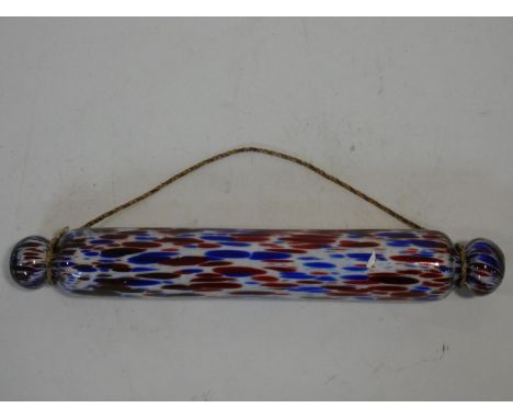 A Victorian Nailsea red and blue blown glass rolling pin. W.42cm 