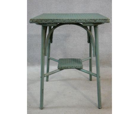 A vintage Lloyd Loom style conservatory occasional table. H.71 W.53 D.53cm 