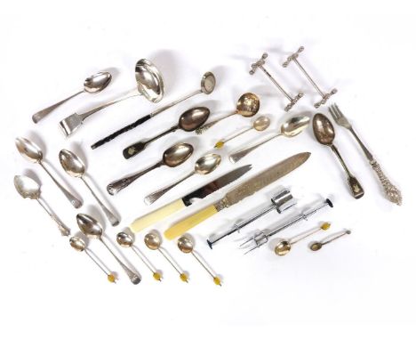 A set of six old English teaspoons, two silver knife rests, a silver preserve spoon, a Georgian whale bone handled ladle, and