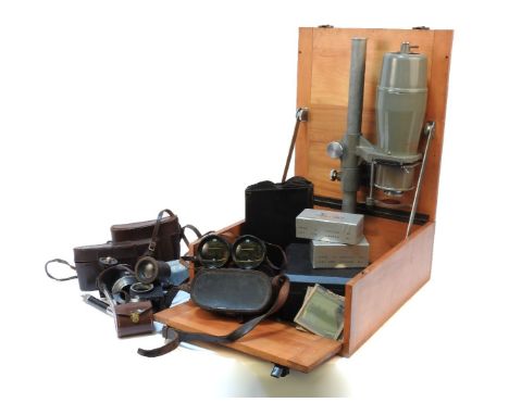 Camera equipment, enlarger, and a pair of binoculars by Heath & Co. Voitlander, etc.