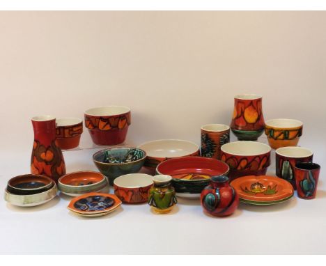 Twenty one items of Poole pottery, Delphis and later vases, dishes, bowls, and ashtrays (21)