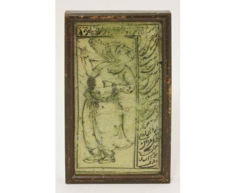 An Iranian ceramic tile fragment, 18th century, decorated with a Savafid figure with cufic script border,17 x 9.5cm, in a woo