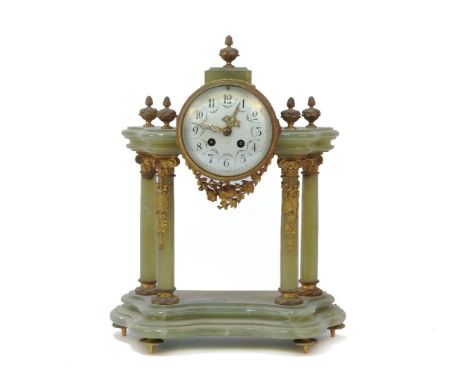 An Empire style agate mantel clock