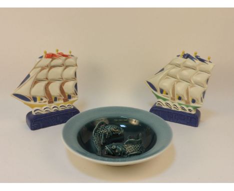 A Poole pottery carp bowl by Alan White, 1998, 38cm diameter, and two studio 'Galleons', 26.5cm high (3)