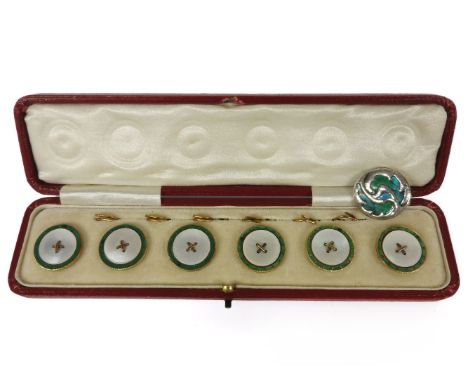 A silver Liberty of London Cymric green and blue enamel button, with planished silver border, marked Birmingham 1902, and a c