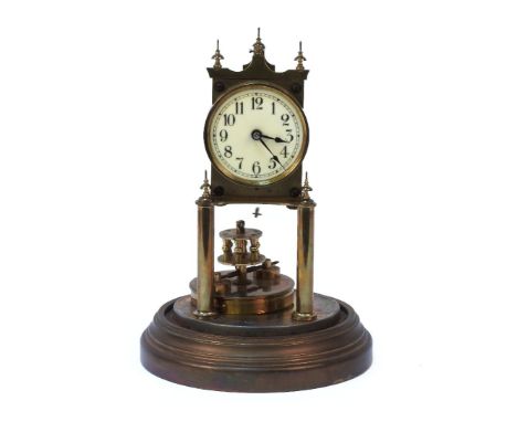 A brass anniversary clock, under a glass dome, 32cm high
