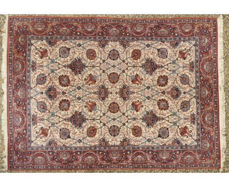 A modern Persian woollen carpet, patterned cream ground,250 x 350cm