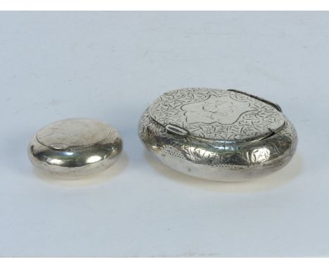 An Edwardian snuff box, of large ovoid form, and one other similar