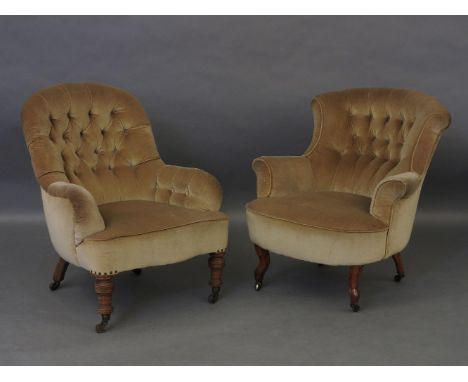 A Victorian mahogany button back armchair, and another similar