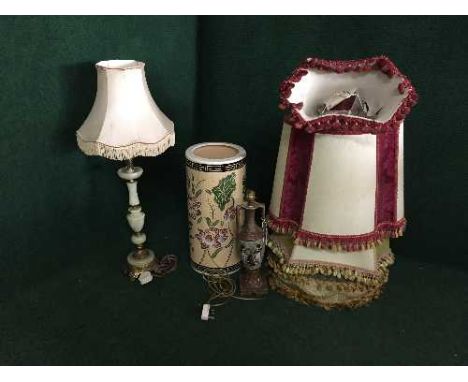 A stick stand, gilt and marble table lamp, Egyptian style table lamp and five vintage lamp shades 