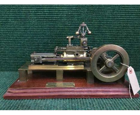 A scale model of a Side Rod Mill Engine, on oak plinth