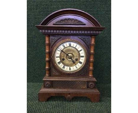 A Victorian oak cased bracket clock
