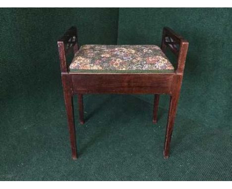 An Edwardian mahogany piano stool 