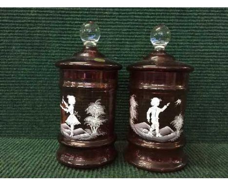 A pair of Bohemian style ruby glass biscuit pots