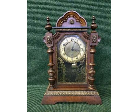 A Victorian bracket clock in architectural case