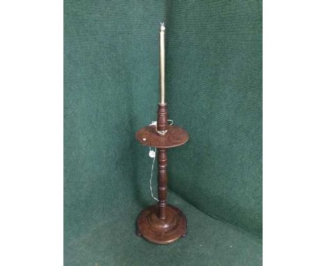 A late Victorian mahogany and brass standard lamp with shade 