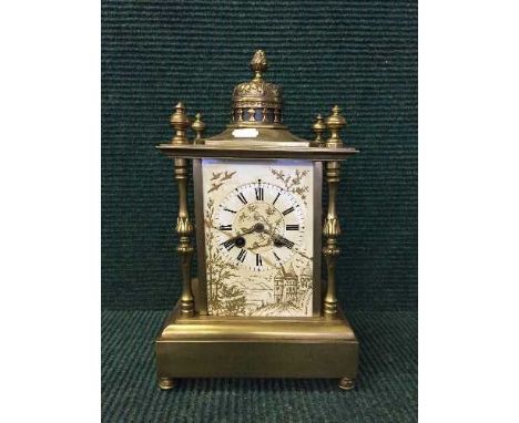 A Victorian brass mantel clock
