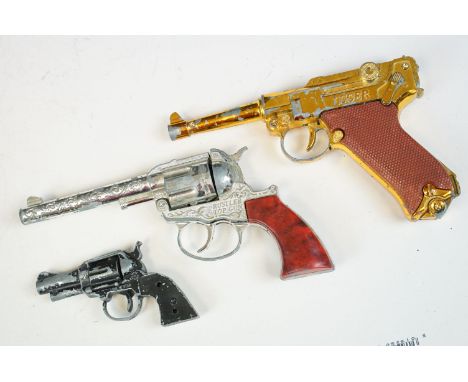 Three Toy Guns featuring Crescent and Lone Star including Rustler Toy Gun, Gambler and Luger, play worn 