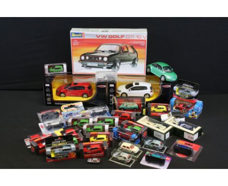 31 Boxed and carded diecast models to include Radstar, Lledo, TescoWelly etc plus a boxed Revell 1/24 VW Golf GTI 16V plastic