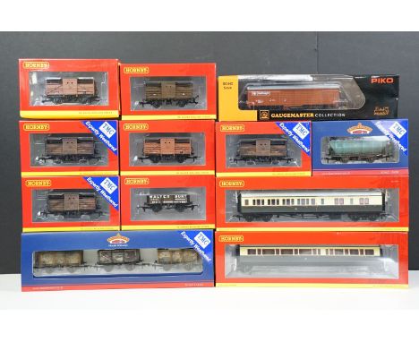 12 Boxed OO gauge items of rolling stock to include 9 x Hornby featuring 3 x Expertly Weathered examples, 2 x Bachmann featur