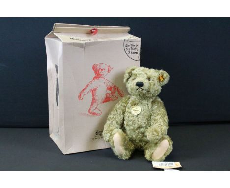 Boxed Steiff 1920 Classic Teddy Bear 000737, with yellow tag and button to ear and in brown box, bear in vg condition, box vg