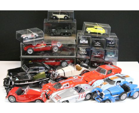 13 Cased diecast models to include mainly IXO models featuring Austin FX3 1954, Berliet 11CV Dauphine 1939, Bugatti Type 41 R