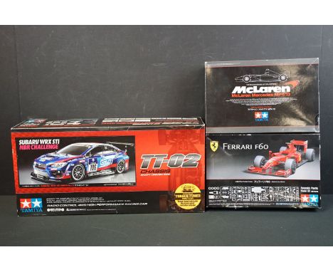 Three boxed Tamiya plastic model kits to include 1/10 scale Subaru WRX STI NBR Challenge TT-02 Chassis Shaft Driven 4WD, 1/20