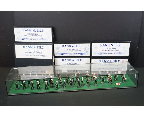 43 R&amp;F Rank &amp; File Royal Navy metal figures contained within a glass display case, figures vg, case 30" in length, al