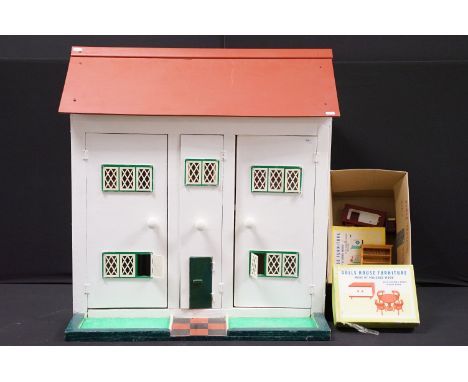 Large scratch built dolls house with white exterior and red roof with three large doors to reveal interior which includes wal