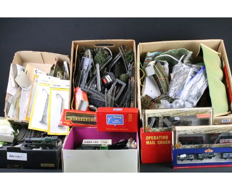 Quantity of OO gauge model railway to include various track, locomotive shells, rolling stock, plastic buildings, carded trac