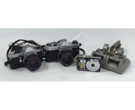 PENTAX 'ME- SUPER' ROLL FILM CAMERA, another PENTAX 'K1000' ROLL FILM CAMERA, a boxed PREMIER 16mm DE LUX FILM JOINRT with Au